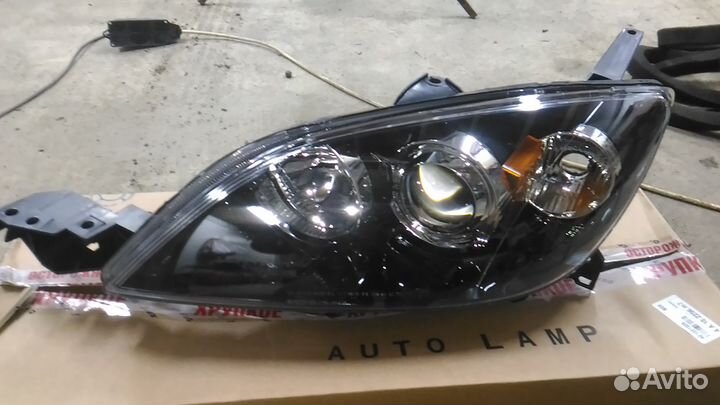 Фара Mazda 3 (седан, хэтчбек) 2004-2009