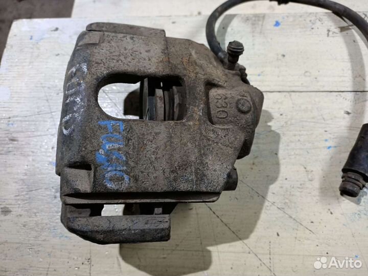 Суппорт тормозной передний правый Ford Fusion