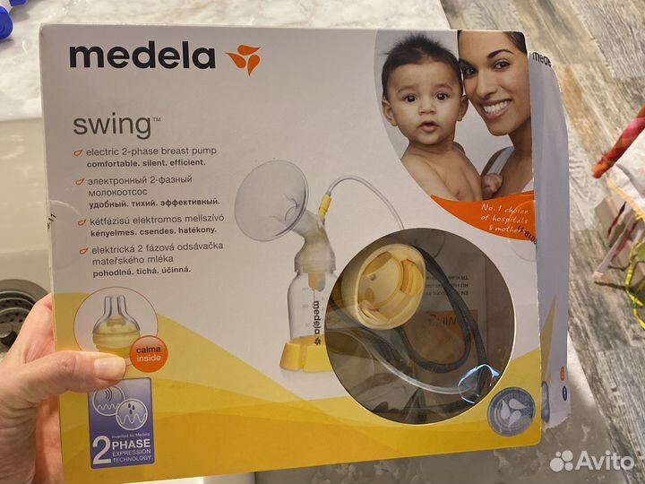 Молокоотсос medela swing