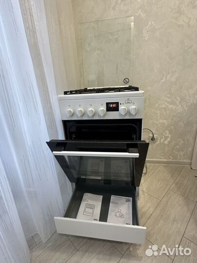 Газовая плита с электрической духовкой AEG