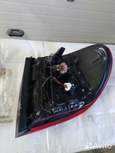 Фонарь задний левый