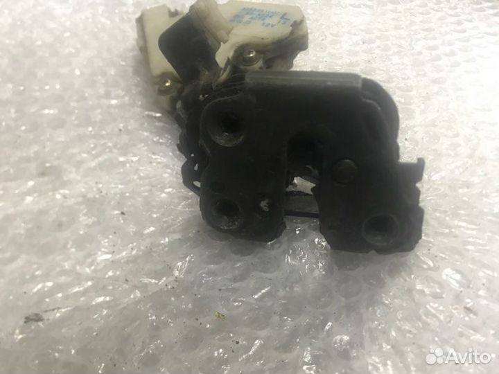 Замок двери задний левый Nissan Almera N15 CG10DE