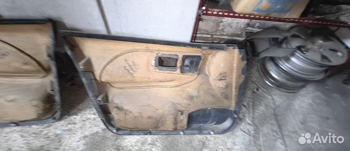 Обшивка карта двери на Субару Импреза 96г