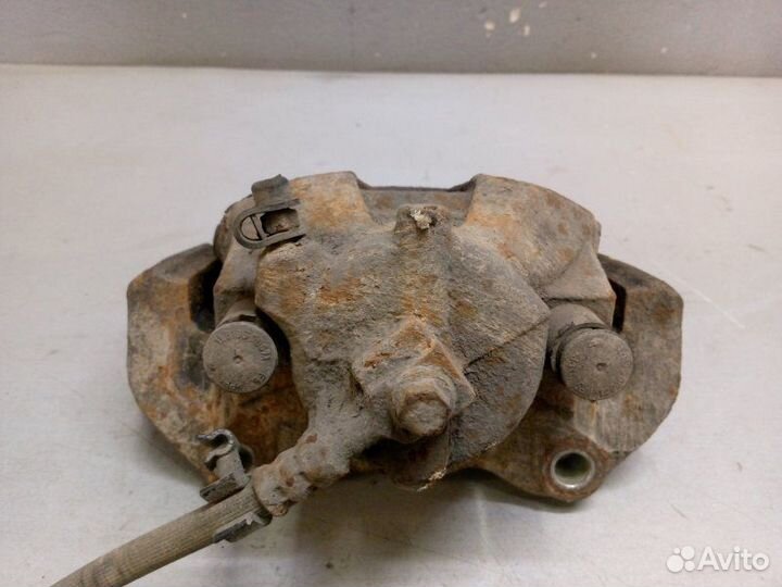 Суппорт передний левый Opel Astra H 2010