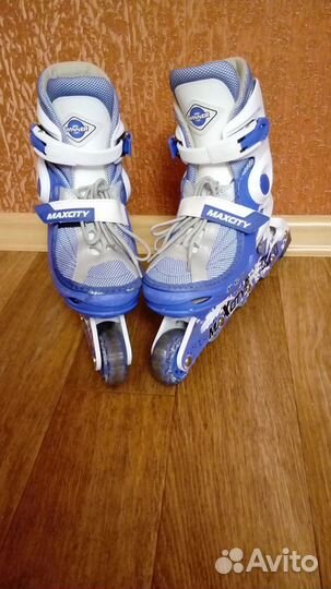 Роликовые коньки