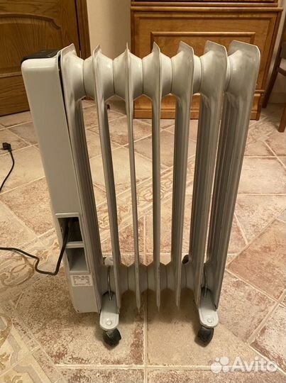 Масляный обогреватель (радиатор). Италия
