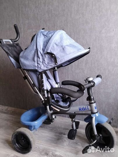 Трехколесный велосипед с ручкой