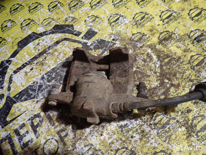 Суппорт тормозной задний левый Peugeot Boxer 250