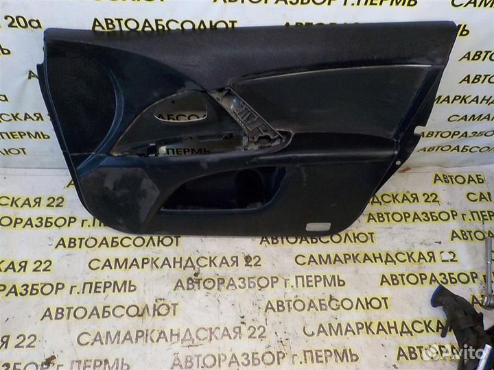 Обшивка двери передней правой Toyota Avensis III
