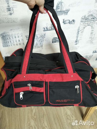 Сумка дорожная на колесах с выдвижной ручкой