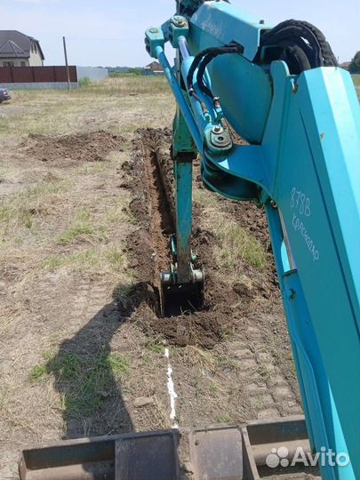 Мини-экскаватор трактор