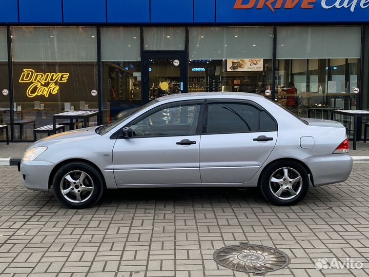 Mitsubishi Lancer 1.3 МТ, 2003, 261 000 км