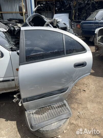 Дверь задняя левая альмера н16