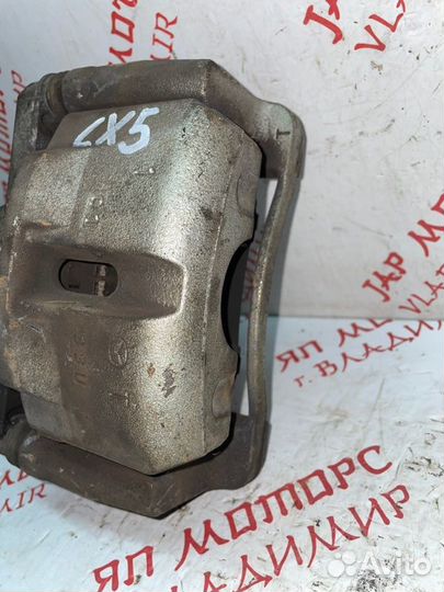 Суппорт тормозной передний левый Mazda Cx5 KE SHY