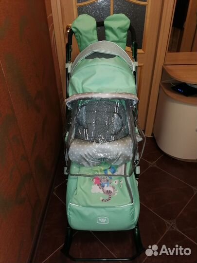 Санки коляска ника 7/4