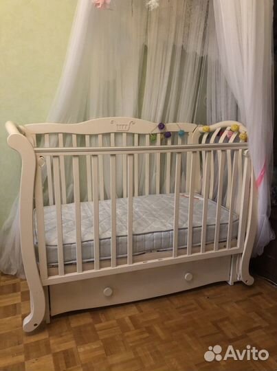 Детская кроватка с маятником Можга