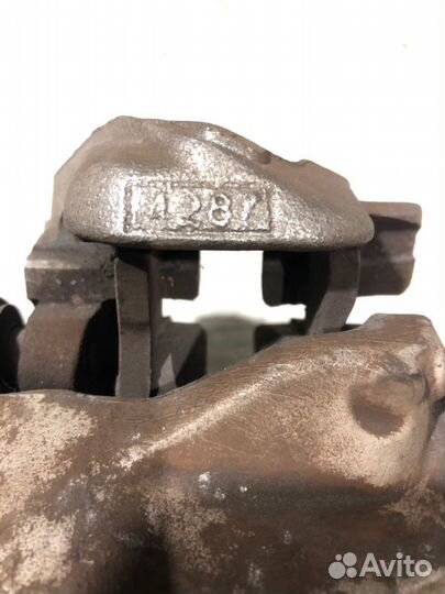 Суппорт тормозной задний левый Mercedes-Benz