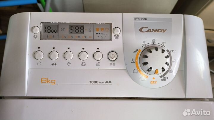 Стиральная машинка с вертикальной загрузкой