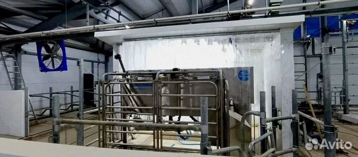 Доильный робот для ферм