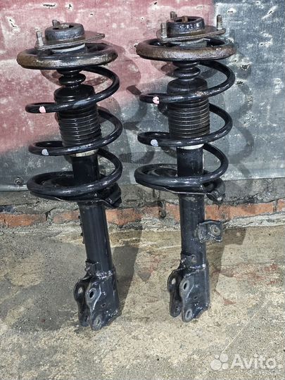 Передние стойки Мицубиси оутлендер2