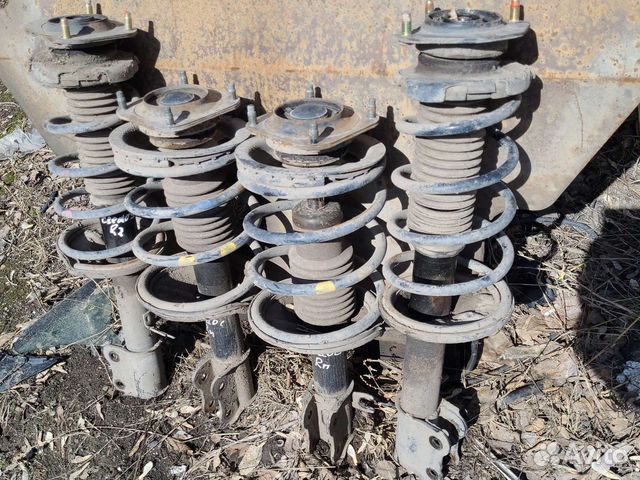 Стойки передние kia clarus