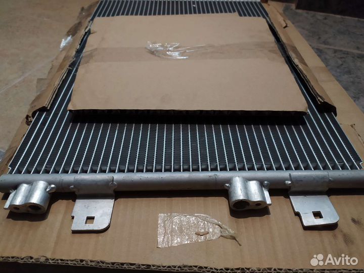 Радиатор кондиционера Nissan Almera G15 2013