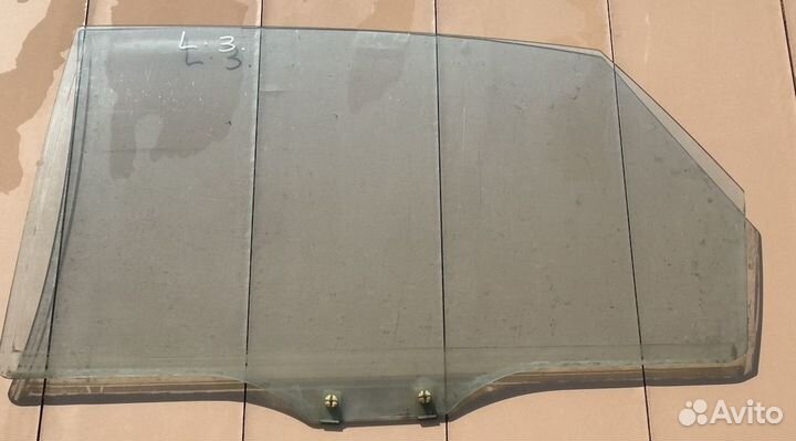 Мазда 626 Стекло двери заднее левое