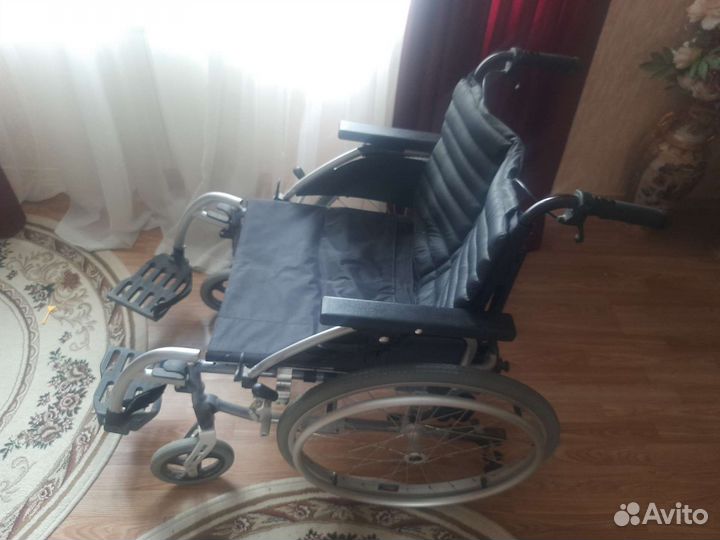 Инвалидная коляска