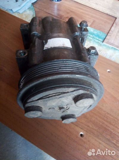 Компрессор кондиционера Киа Спортедж-1