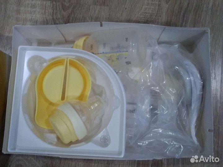 Молокоотсос medela