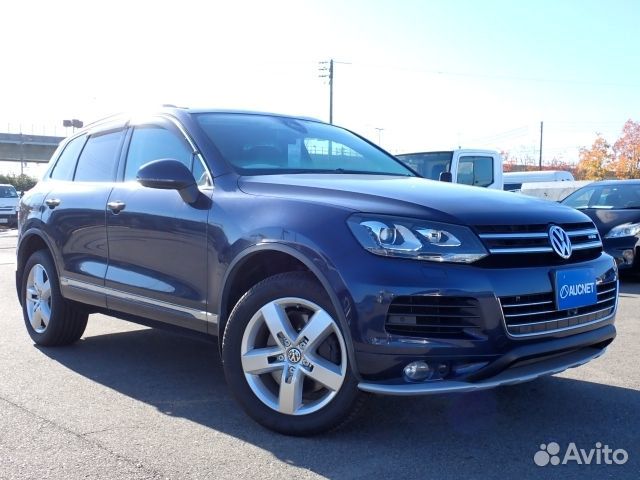 Фара в сборе правая Volkswagen Touareg 7P5 cgea