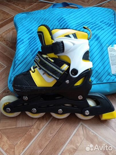 Роликовые коньки