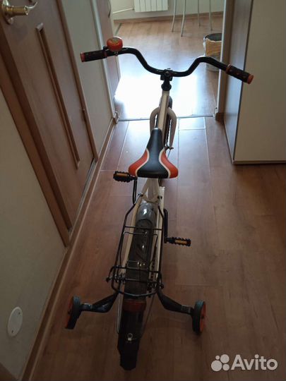 Четырехколесный детский велосипед