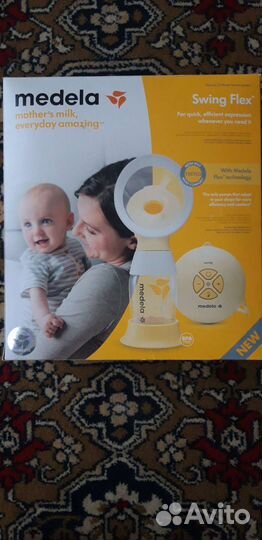 Молокоотсос medela электрический