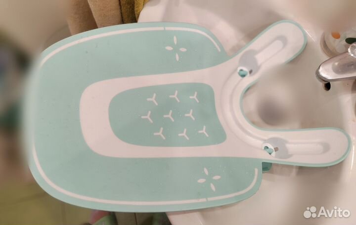 Горка для купания новорожденного в раковине