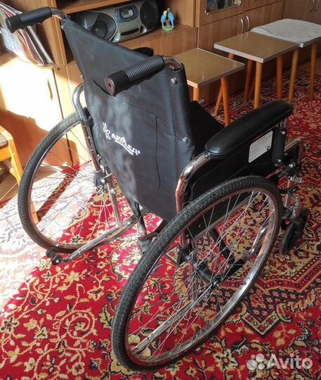 Инвалидная коляска