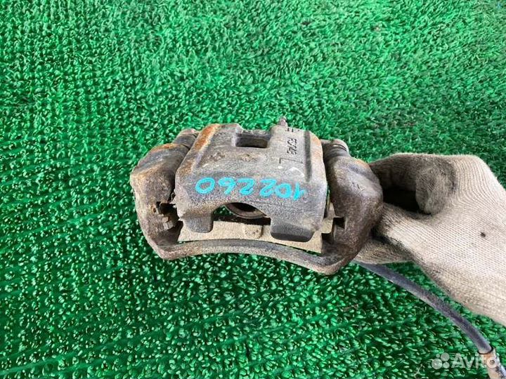 Суппорт тормозной лев. зад. Toyota Land cruiser, L