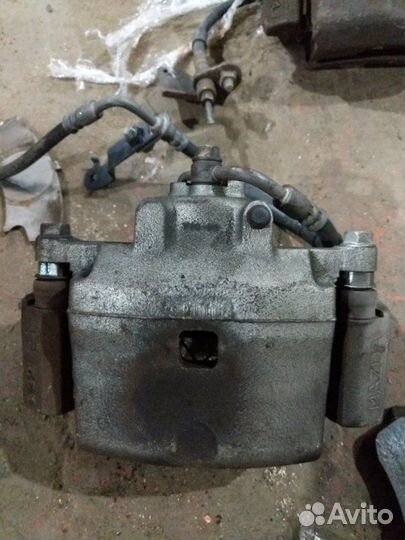 Суппорт тормозной передний левый Mazda 6 GH