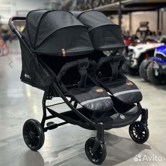 Коляска для двойни погодок