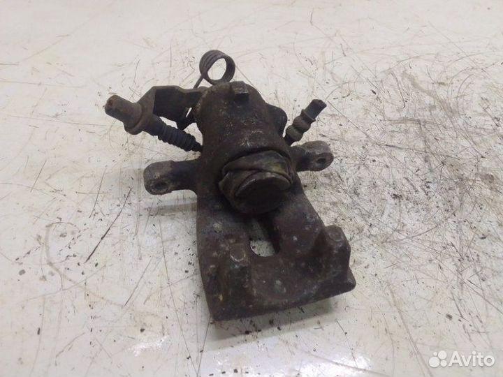 Тормозной суппорт задний левый Opel Zafira B 2008