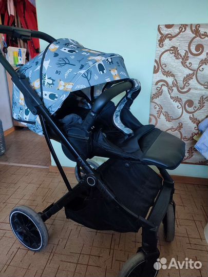 Прогулочная коляска с реверсивным блоком