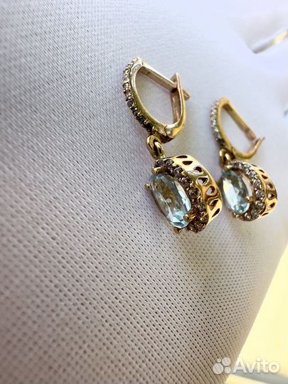 Золотые серьги с топазами