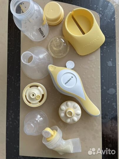 Молокоотсос medela ручной