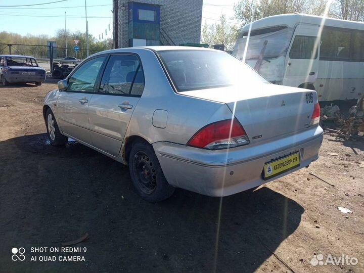 Стартер Mitsubishi Lancer Сedia 4G15 F1C1A