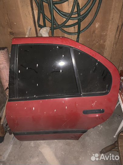 Дверь задняя левая Nissan Primera
