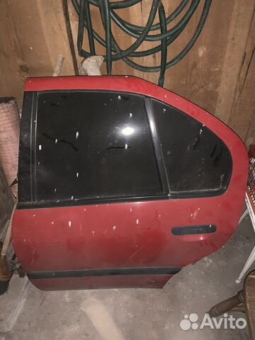 Дверь задняя левая Nissan Primera