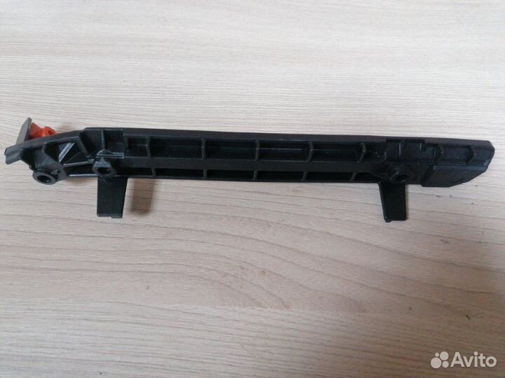 Кронштейн бампера передний правый Opel Astra J