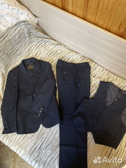 Школьный костюм для мальчика 134 gulliver