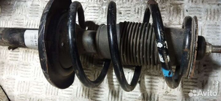 Стойка амортизатора переднего левого VolkswagenSha