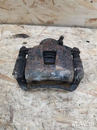 Суппорт передний левый Chevrolet Lacetti хэтчбэк